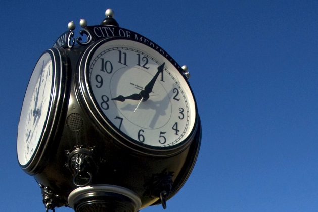 close up of the clock tower in front of Meridian City Hall