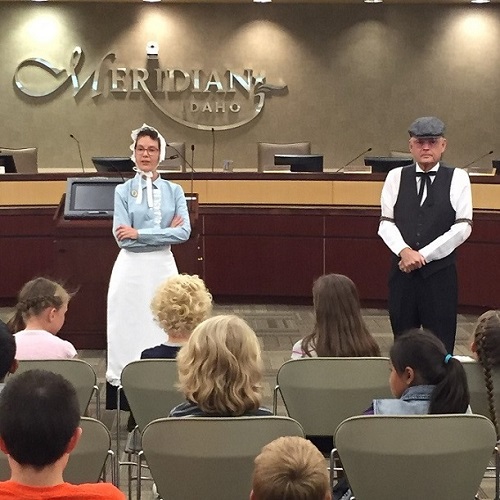 history presenters dressed in historical clothing