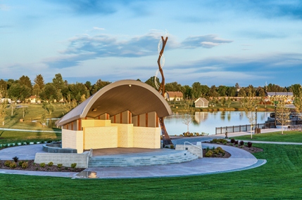 Kleiner Park stage and bandshell with cloudy sky overhead