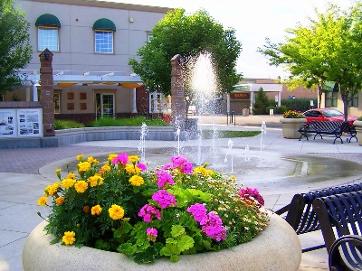 flowers and splash pad at Generations Plaza