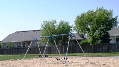 swings at Gordon Harris Park