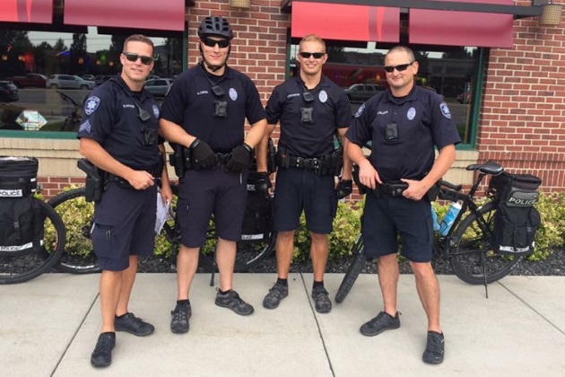 Bike Patrol Officers standing together and smiling