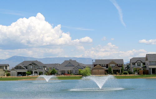 scenic neighborhood with pond and fountains