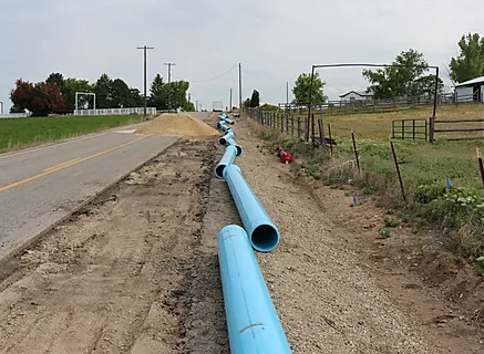 water pipes resting on the ground