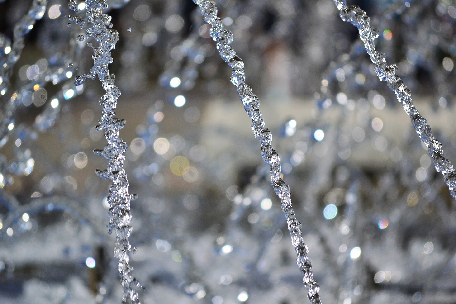 water falling from a decorative fountain
